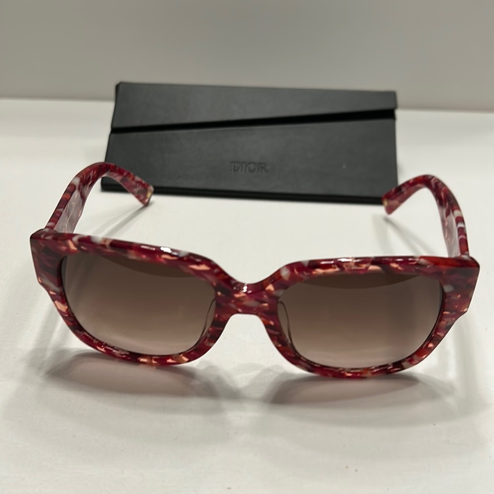 Dior women's sunglasses. Pink floral design. Case included. Like new.